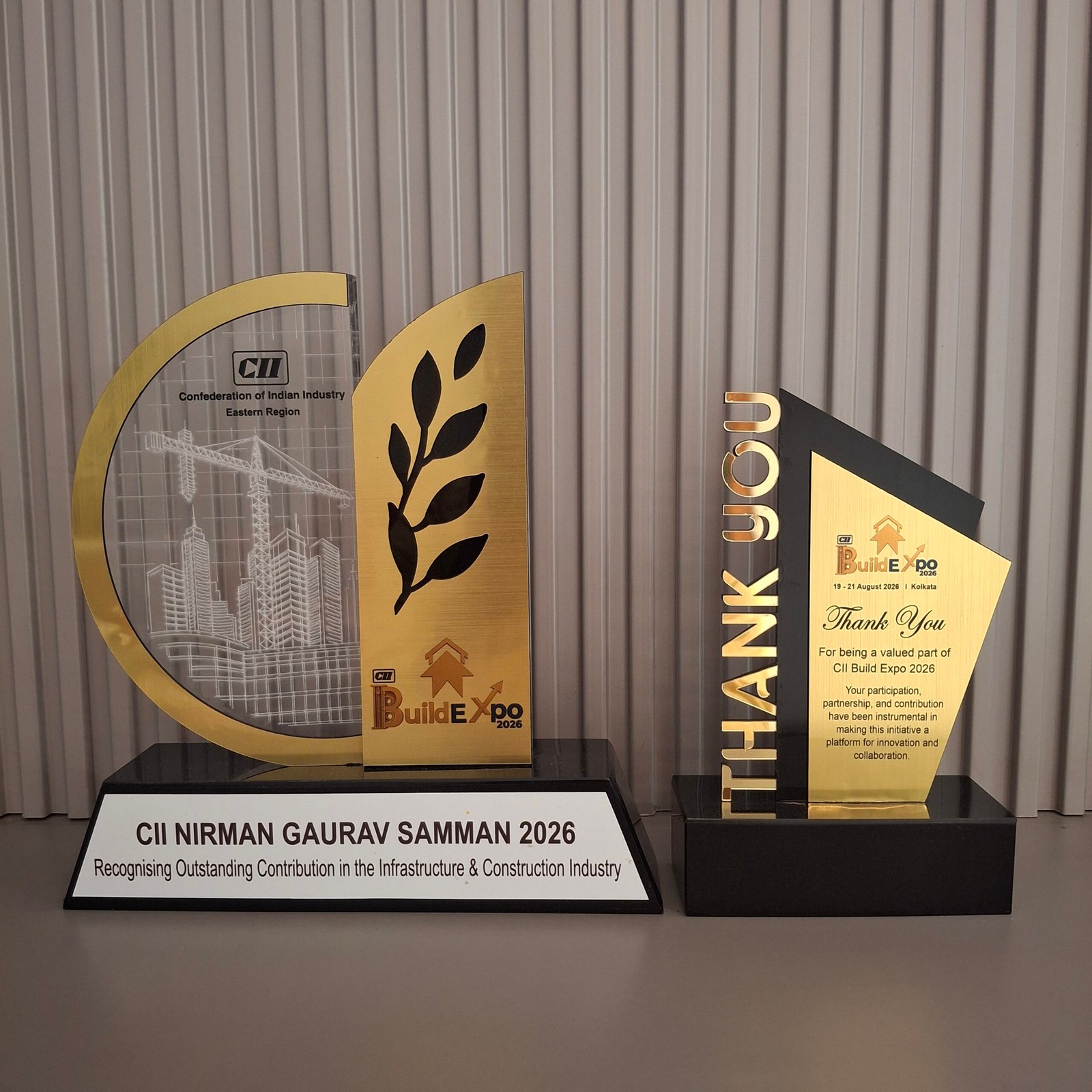CII Nirman Gaurav Samman 2026 trophy beside the CII Build Expo 2026 thank-you plaque
